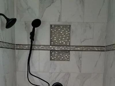 marbled tile shower renovation