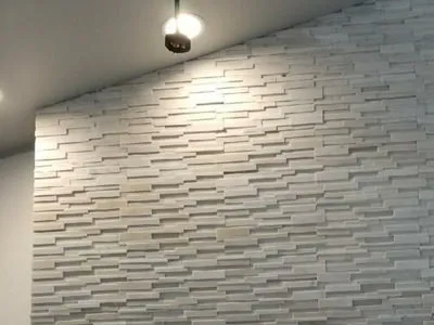 tile fireplace between kitchen and living room